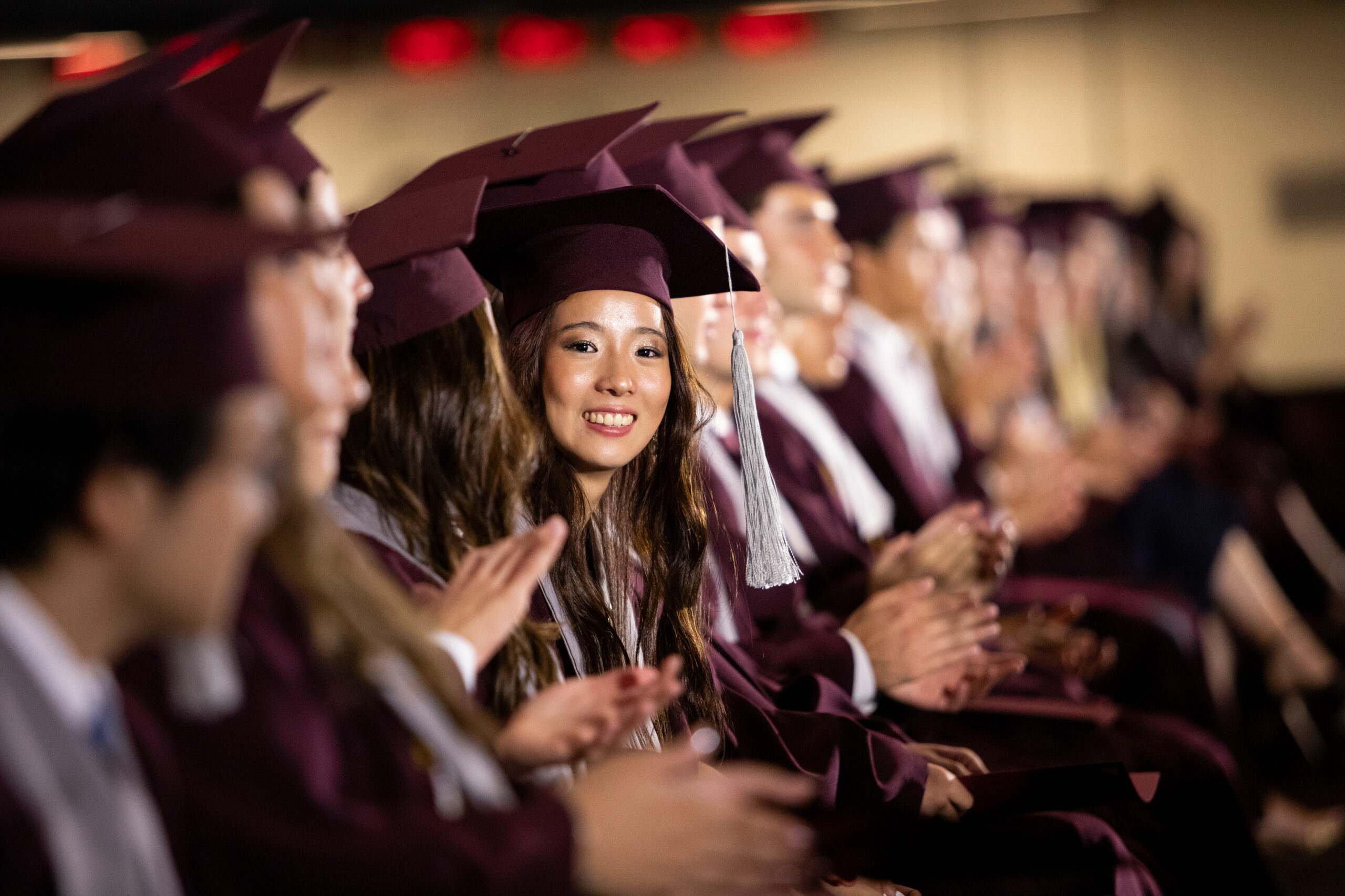 Happy female graduate during the graduation ceremony