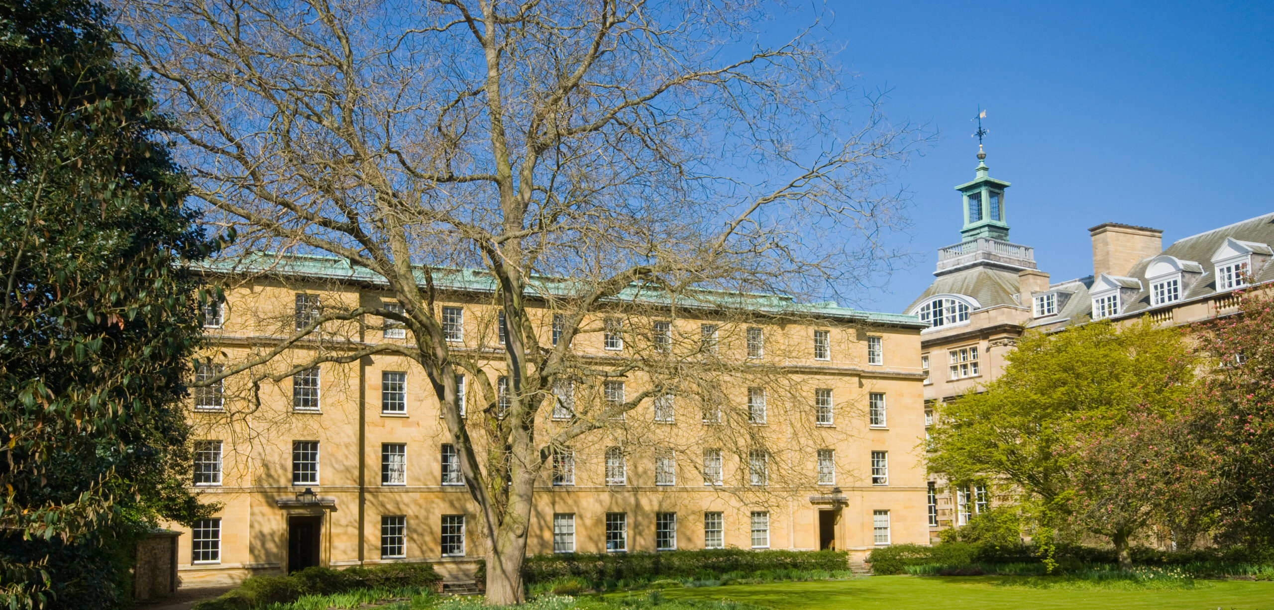 "The Stevenson Building in Third Court was designed by J. J. Stevenson, in the 1880s and was extended in 1905 as part of the College's Quadcentenary. In 1947 Professor Richardson designed the second building, the neo-Georgian Chancellor's Building (W staircase), completed in 1950. Third Court's Memorial Building (Y staircase), a twin of the Chancellor's building was completed in 1953 for"